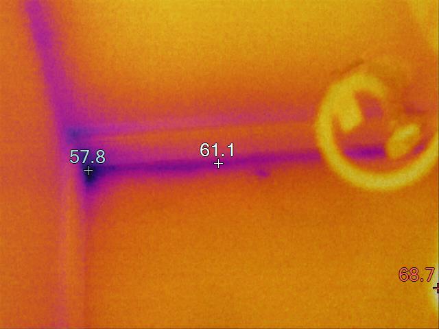 thermal image of toilet supply line leaking behind wall